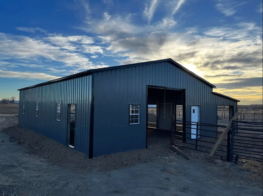 Large barn with sunset